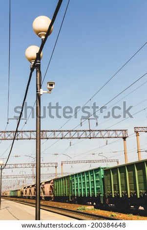 Chamber of video observation and lanterns on railway platform