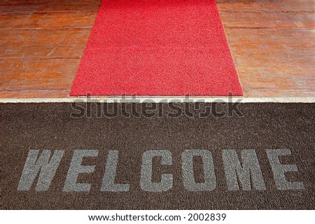 Welcome sign on a hotel entrance path