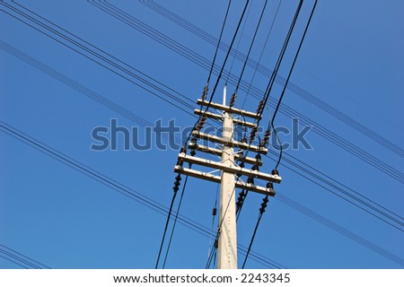 Two overhead electricity wire lines crossing