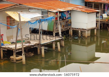Poor housing along a canal in Bangkok