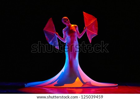 MOSCOW, RUSSIA - DECEMBER 08: Dancer in mask on Charity concert in Nations Theater in Moscow, Russia, December 08, 2012