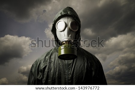 Man wearing a gas mask on his face