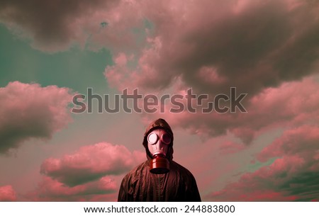 Man wearing a gas mask on his face