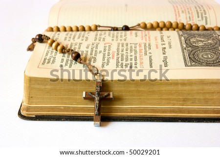 The book of Catholic Church liturgy and rosary beads
