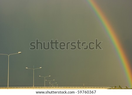 bright rainbow in the dark sky
