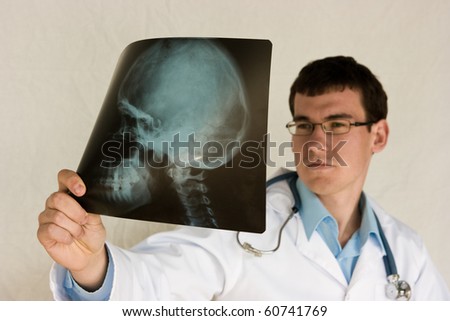 stock photo young resident doctor at the practice