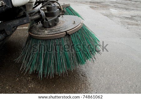 part of a street cleaning vehicle