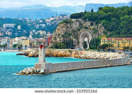 view of mediterranean resort, Nice, Cote d\'Azur, France. french riviera. Front of harbor with lighthouse