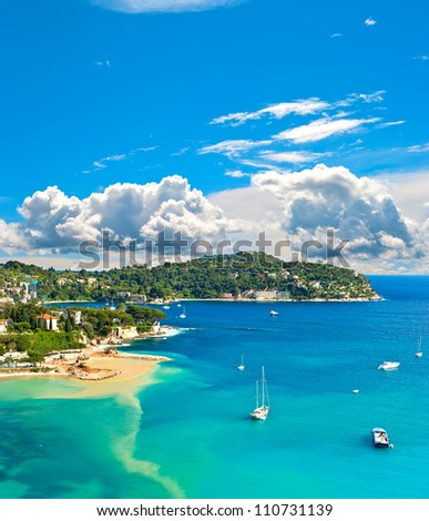view of luxury resort and bay of Cote d\'Azur. Villefranche by Nice, french riviera. turquoise sea and blue sky