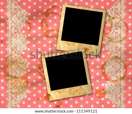 two old photo frames over dirty pink white polka dot background with lace border