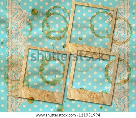 three old photo frames over dirty blue white polka dot background with lace border