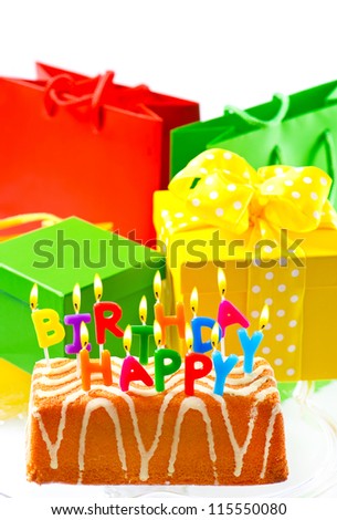 happy birthday to you. birthday cake with burning candles and gifts. card concept