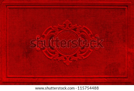 vintage red book cover with floral ornament. textured background
