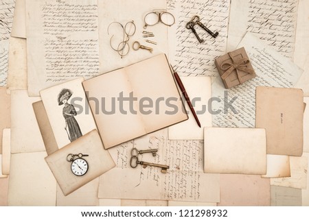 antique accessories, old letters and fashion drawing. vintage nostalgic background
