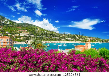 French Reviera, View Of Luxury Resort And Bay Of Villefranche-Sur-Mer Near Nice And Monaco. Seafront Landscape With Azalea Flowers