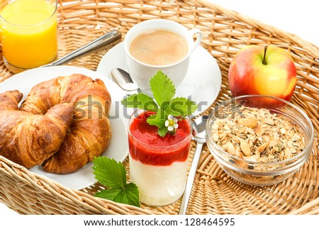 Breakfast With Coffee, Croissants, Orange Juice And Fresh Strawberry Yogurt
