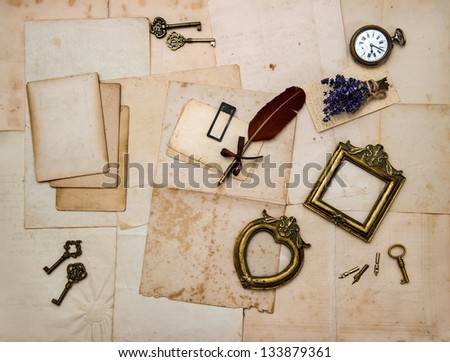 vintage things, picture frames, keys, flowers, old letters and photos. nostalgic sentimental paper background