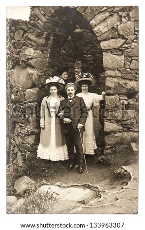 BADEN-BADEN, GERMANY - CIRCA 1915: group of wealthy high society men and women in old castle, circa 1915 in Baden-Baden, Germany