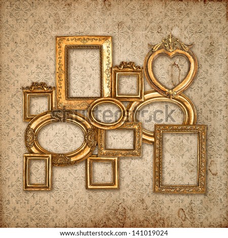 antique golden framework over vintage pattern wallpaper. baroque style art background