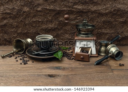 vintage still life with cup of coffee and antique accessories. retro style image
