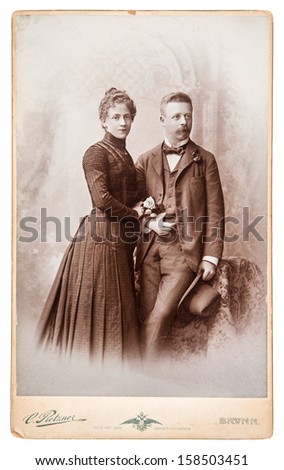 Berlin, Germany - Circa 1880: Antique Family Portrait Man And Woman Wearing Vintage Clothing, Circa 1880 In Berlin, Germany
