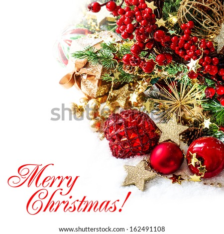 festive decoration with baubles, golden garlands, christmas tree and red berries. Card concept with sample text Merry Christmas!