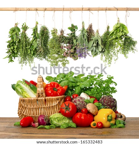 Fresh Vegetables And Herbs On Wooden Background. Raw Food Ingredients. Shopping Basket. Kitchen Interior