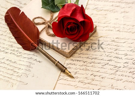Old Letters, Rose Flower And Antique Feather Pen. Romantic Vintage Background. Retro Style Dark Toned Picture. Selective Focus