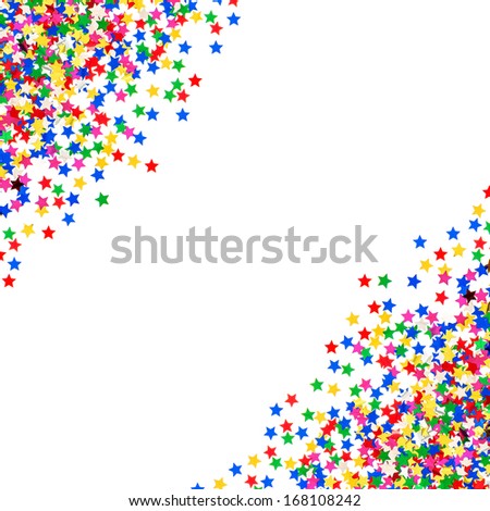 colorful star shaped confetti. festive holidays background