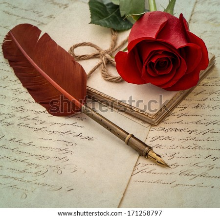 old letters, rose flower and antique feather pen. romantic vintage background. selective focus