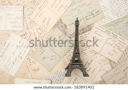 antique french postcards and souvenir Eiffel Tower landmark from Paris. Nostalgic still life