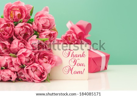 Pink tulips, gift and greeting card with sample text Thank You, Mom! Mother\'s Day concept