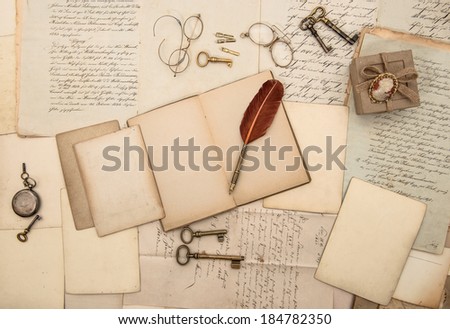 vintage writing accessories, old papers, letters and keys. documents and manuscripts