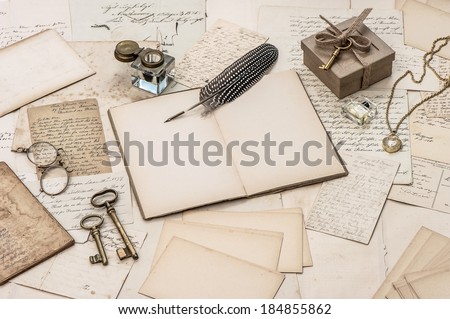 open diary notebook, old letters and womans accessories. nostalgic sentimental background