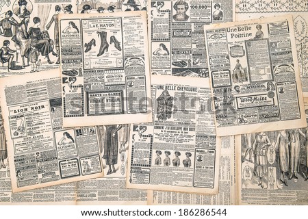 FRANCE, PARIS - CIRCA 1919: newspaper pages with antique advertisement. Woman\'s fashion magazine Le Petit Echo de la Mode
