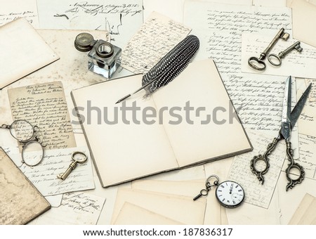 open journal, old handwritings and postcards. retro style toned picture