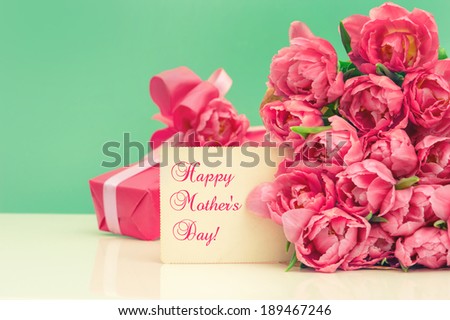 Pink tulips, gift and greeting card with sample text Happy Mother\'s Day!