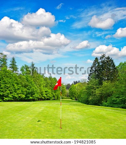 golf field. green grass and blue sky. european landscape