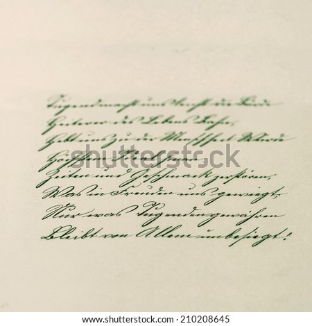 vintage handwriting. antique manuscript. aged paper background. retro style toned picture