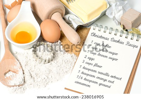 Christmas cookies ingredients eggs, flour, sugar, butter, yeast. Recipe book with sample text