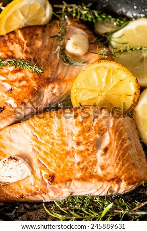 Grilled salmon with herbs, garlic and lemon. FIsh food