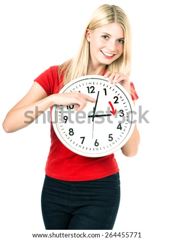 Young woman holding a clock. Time management concept. Summer time (Daylight Saving Time)