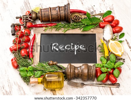 Fresh vegetables, spices and herbs with blackboard. Food ingredients. Recipe