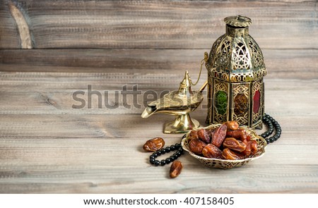 Arabian lantern, dates and rosary. Islamic holidays concept. Ramadan decoration