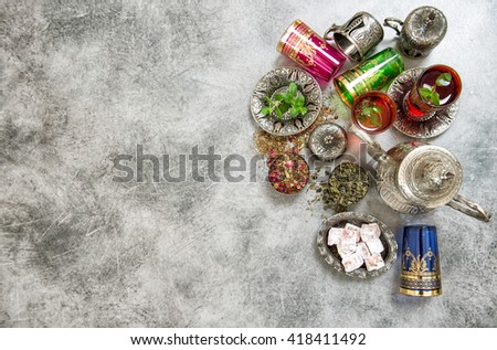 Arabic tea table setting. Herbal tea. Green tea. Tea tradition. Oriental hospitality. Ramadan kareem. Muslim holidays. Islam