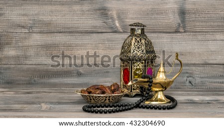 Vintage arabic lantern islamic rosary beads. Oriental holidays decoration with dates fruits