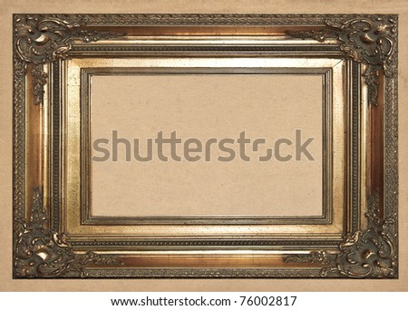 old golden frame on vintage wallpaper background
