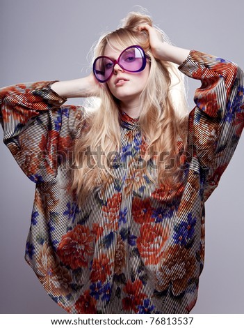 beautiful fashion woman wearing funky sunglasses