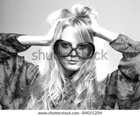 beautiful fashion woman wearing funky sunglasses