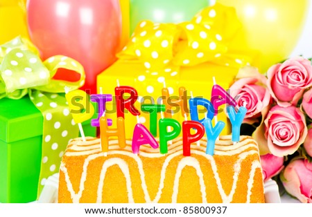 happy birthday! party decoration with roses flowers, cake, balloons, gifts and candles. card concept